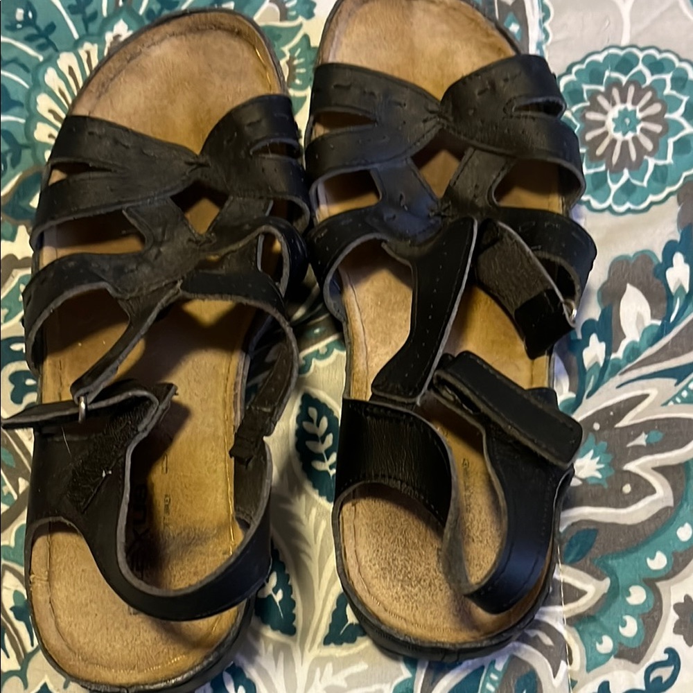 Elegant Black Sandals with Cushioned Footbed and Adjustable Straps I think size
